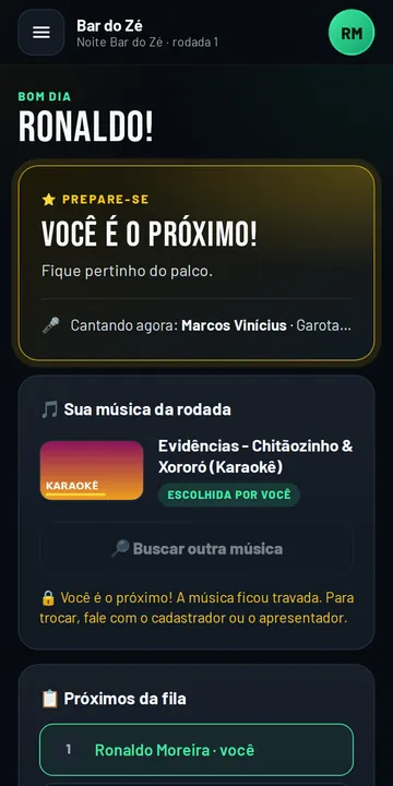 App do cantor do Karaokê Brasil mostrando a vez na fila e a música da rodada